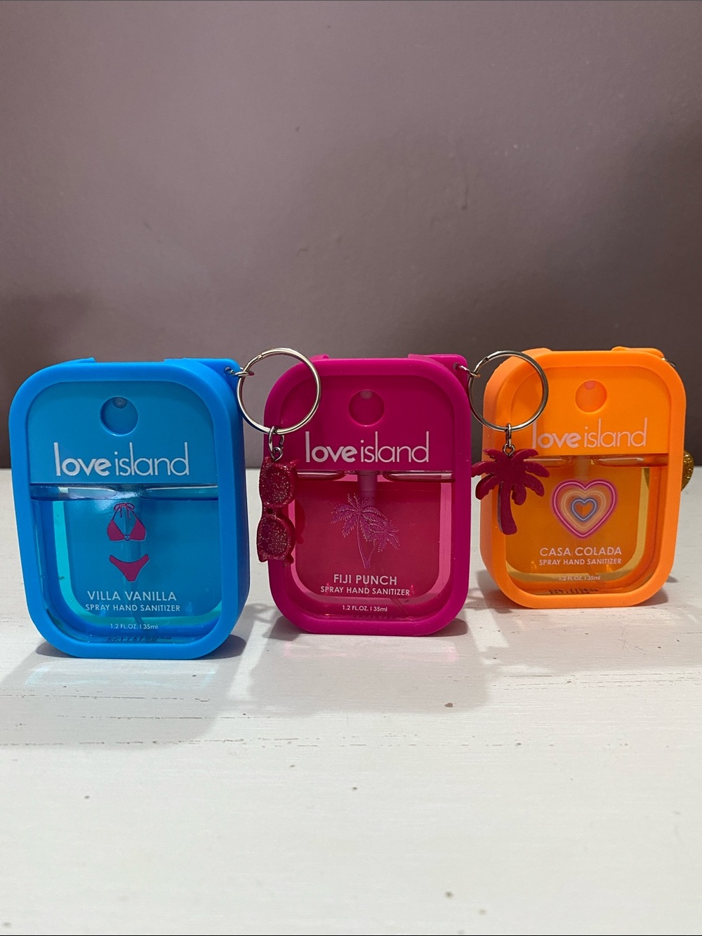 Love Island Travel Spray Hand Sanitizer Keychain Set - Blue, Pink, Orange